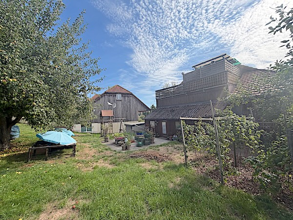 Dreifamilienhaus mit Garten, Werkstatt und Ladenlokal