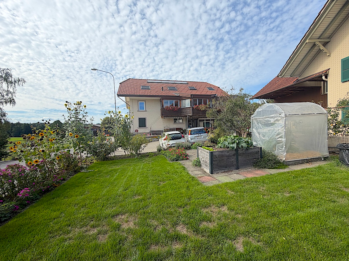 Dreifamilienhaus mit Garten, Werkstatt und Ladenlokal